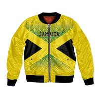 Gold bomber jacket with black sleeves panels, green tribal pattern front, zip-up