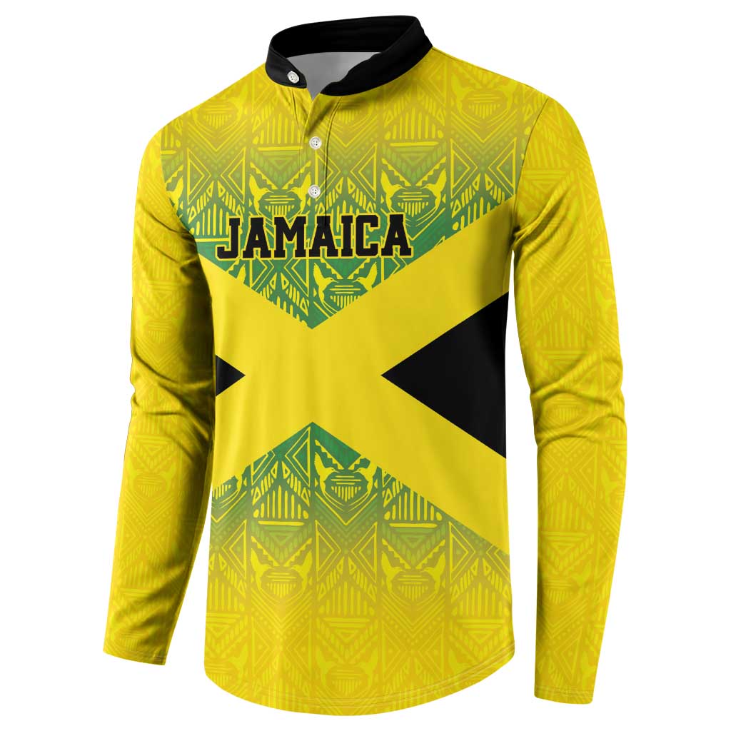 Gold button-up sweatshirt with Jamaica crest graphic, X-shaped accents, patterned sleeves