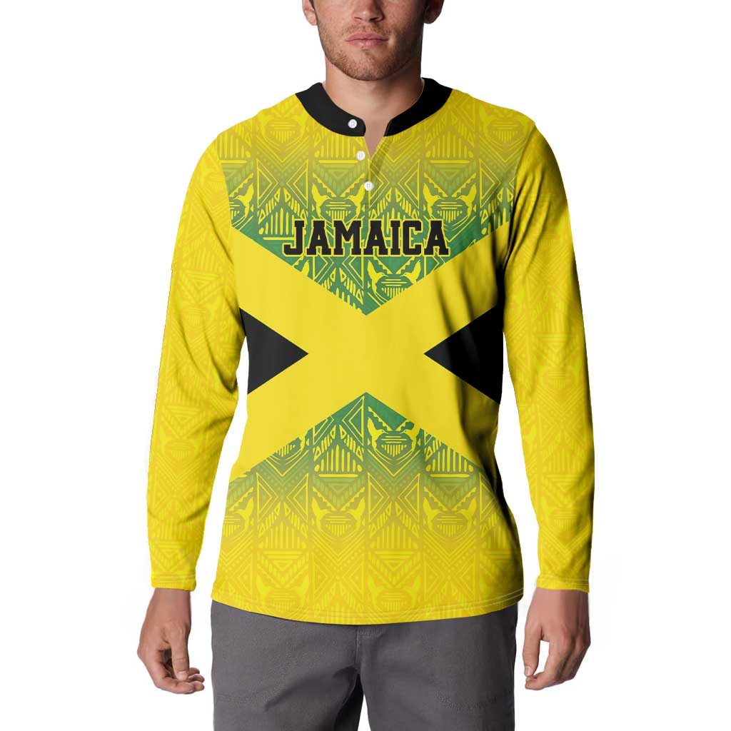 Gold button-up sweatshirt with Jamaica crest graphic and bold X motif, long sleeves