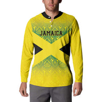 Gold button-up sweatshirt with Jamaica crest graphic and bold X motif, long sleeves
