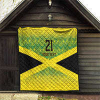 Wall-hung quilt featuring green pattern, yellow X cross, black border, "21" and "YOUR TEXT".