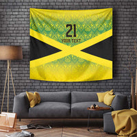 Wall tapestry on brick wall: green and yellow pattern with black Jamaican flag X and 21 YOUR TEXT