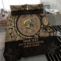 Aztec-style black bedding set with gold border pattern, duvet, and two pillowcases