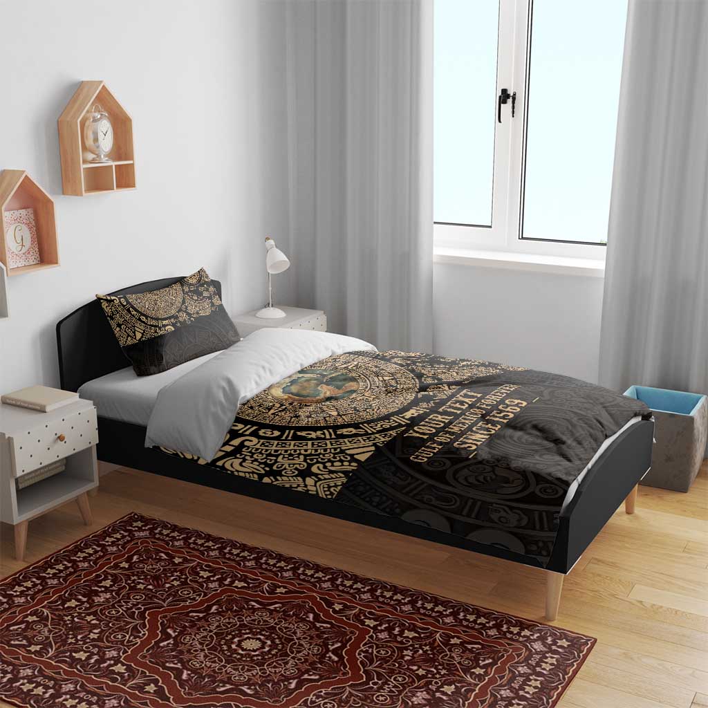 Black and gold Aztec-style bedding set with printed medallion on duvet and two pillowcases