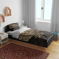 Black and gold Aztec-style bedding set with printed medallion on duvet and two pillowcases