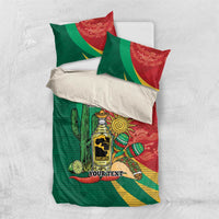 Personalized bedding set flat lay with green-red tequila bottle, cactus, and sombrero art