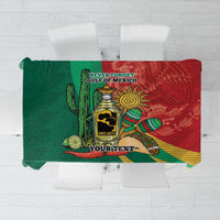 Green and red Mexico-themed tablecloth with cactus, tequila bottle, and banner text