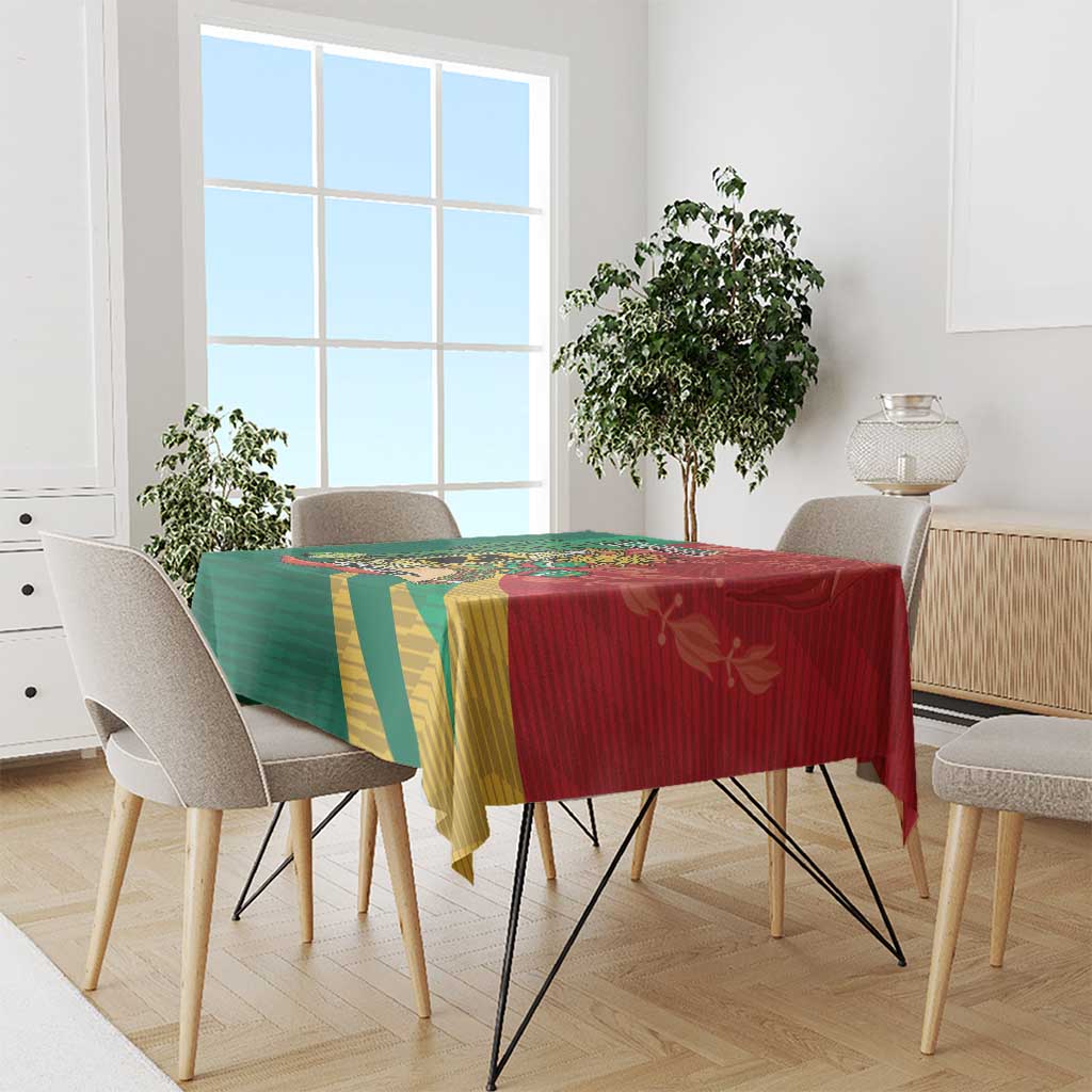 Green and red Mexico-themed tablecloth with striped pattern draped on dining table