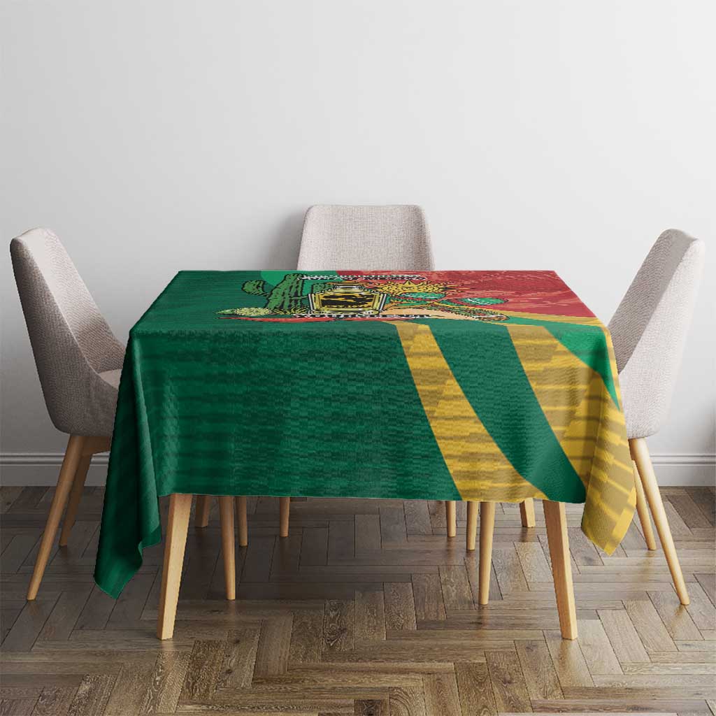 Green and red Mexico-themed tablecloth with diagonal stripes, draped on rectangular table