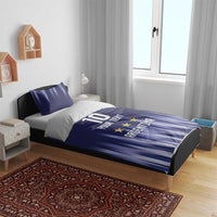 Blue Argentina bedding set on bed with vertical stripes, number 10, three stars, and custom text