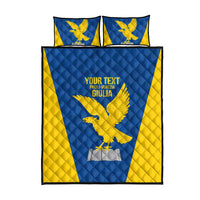 Blue and yellow quilt set with centered eagle crest and two matching pillow shams