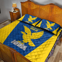 Blue and yellow quilt bed set with eagle design and two matching decorative pillow shams