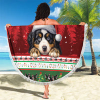Round beach blanket featuring a Bernese mountain dog in a Santa hat, Merry Swissmas border