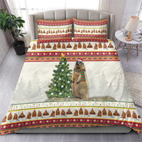 Christmas bedding set on bed: white comforter with red striping, dog in scarf, pine tree print
