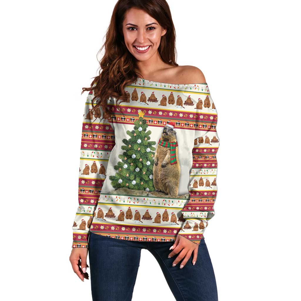 Off-shoulder Christmas sweater with festive pattern, tree and marmot graphic on cream knit