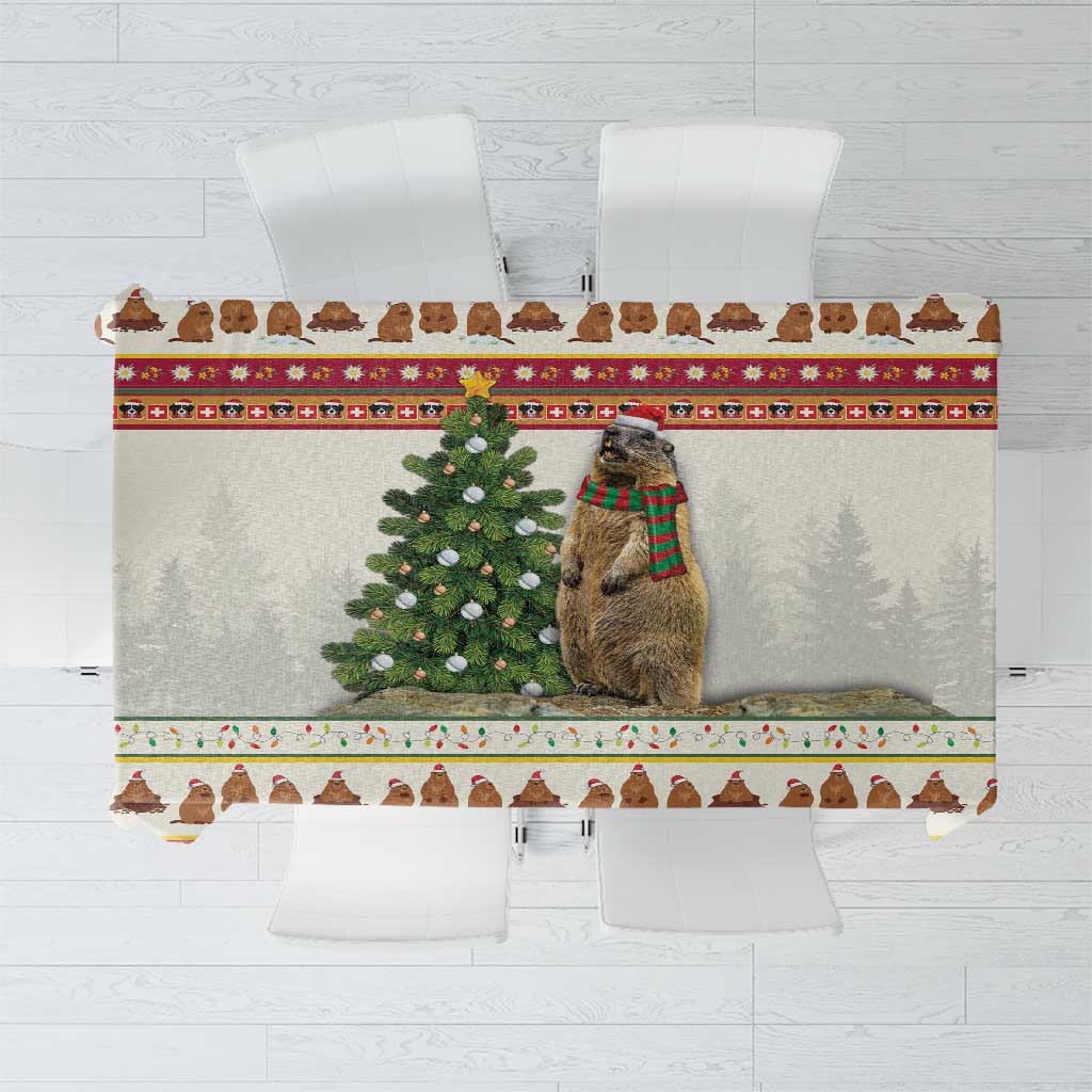Red Christmas tablecloth with cow, evergreen tree, and holiday border pattern