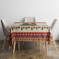 Cow print Christmas tablecloth with colorful border on square dining table