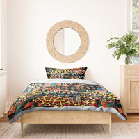 Animal-print bedding set with duvet cover and pillow sham, multicolor patchwork on black