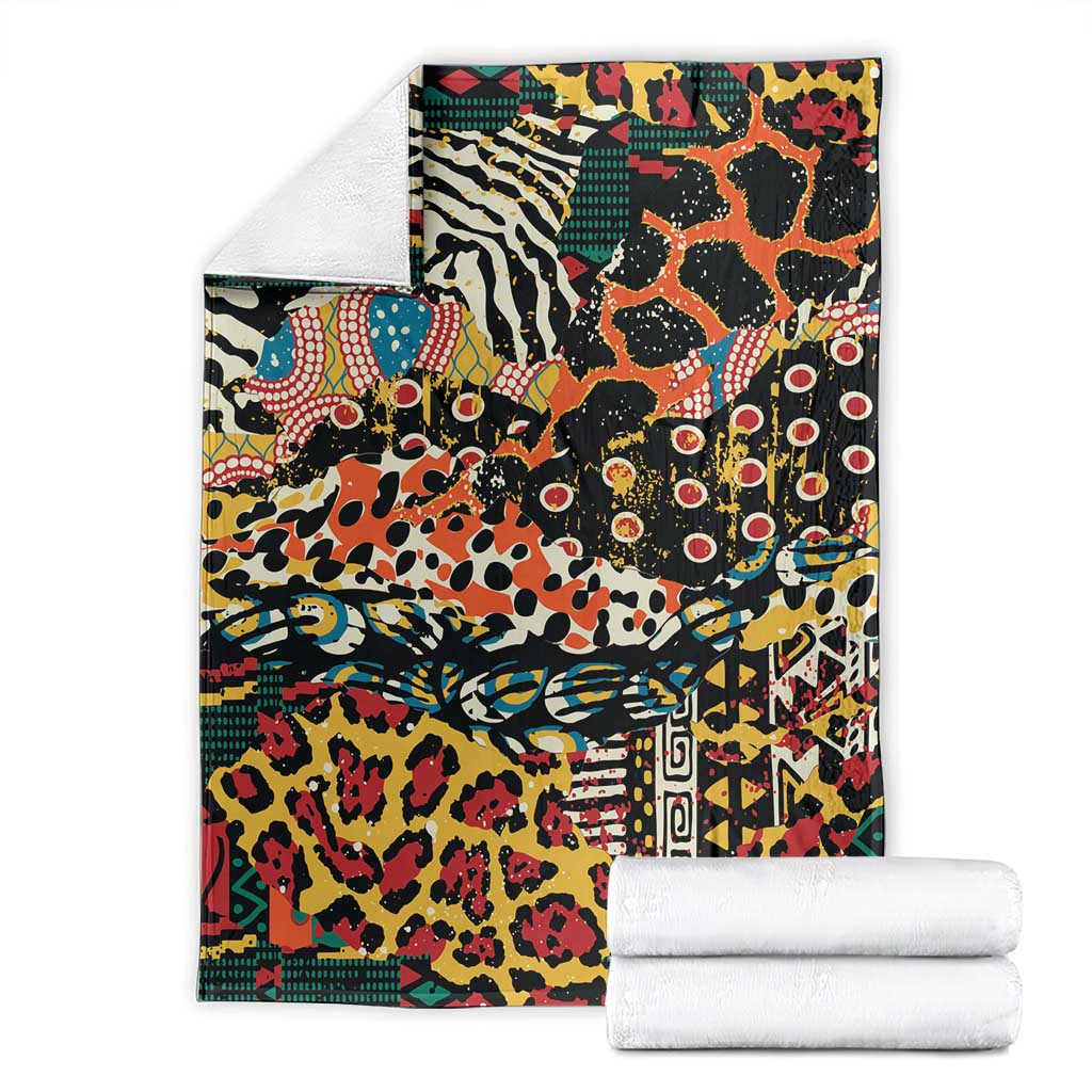 Multicolor wild animal skins blanket with patchwork graphics, shown folded with white towels