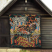Multicolor wild animal skins quilt hanging on a wall with decorative geometric edging