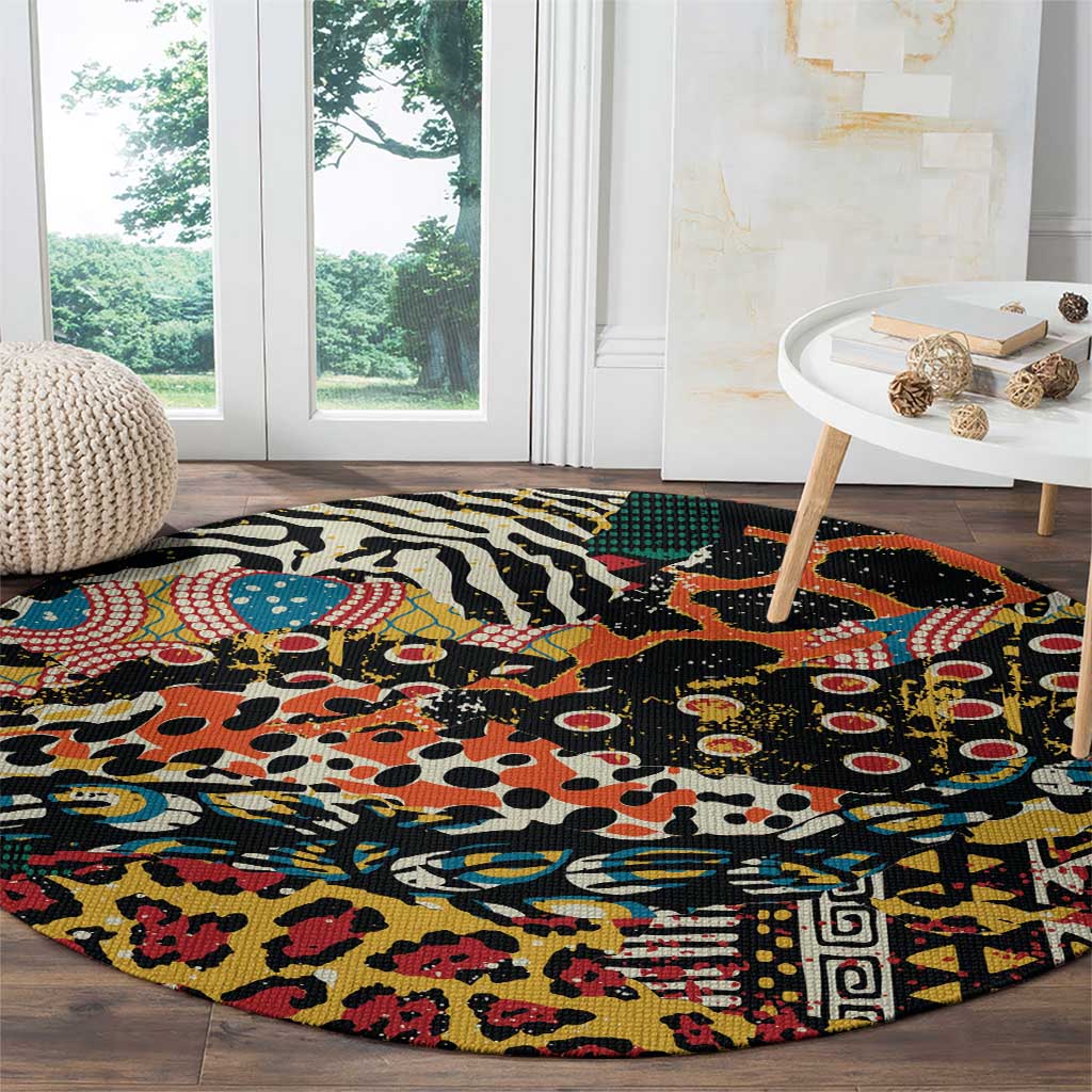 Round black area rug with vibrant mixed animal patchwork and tribal-style edging
