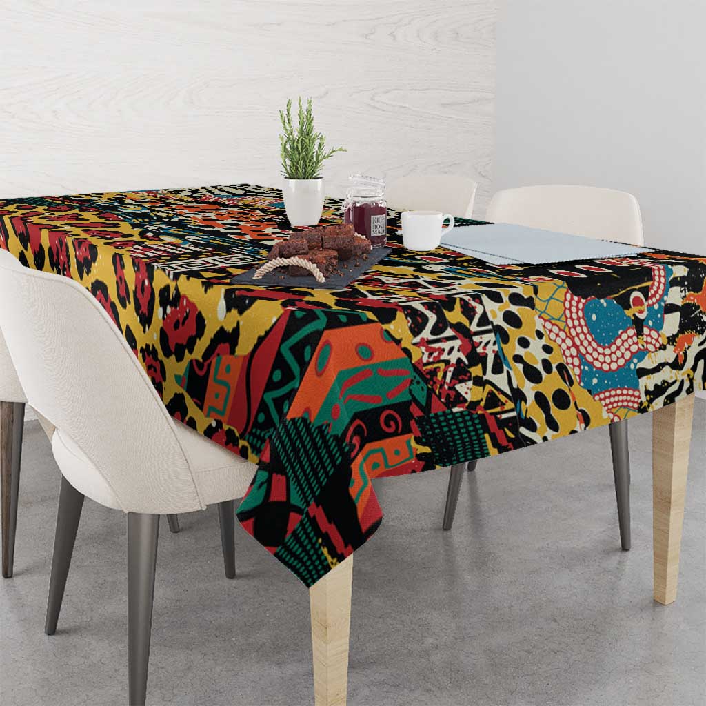 Black multicolor animal-print tablecloth with bold leopard spots and tribal-style blocks