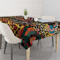 Black multicolor animal-print tablecloth with bold leopard spots and tribal-style blocks