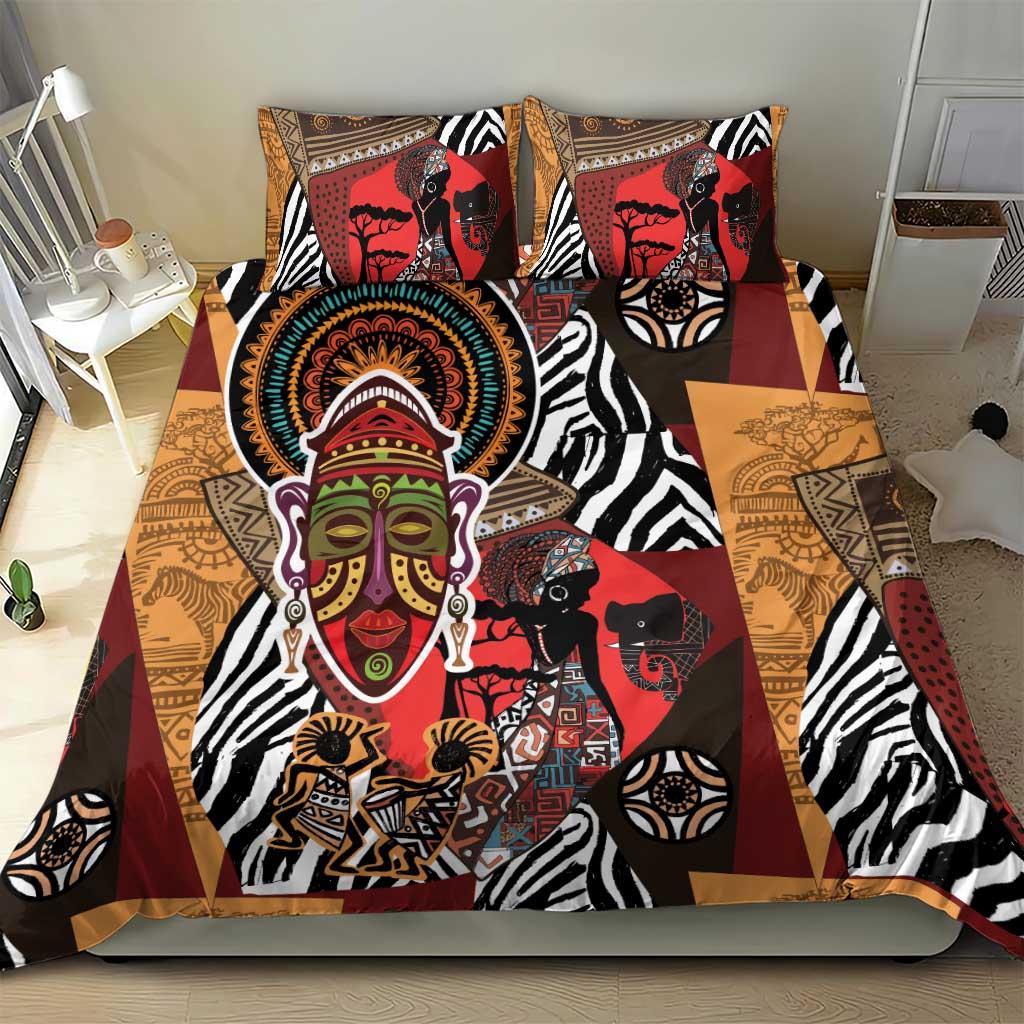 Bedding set featuring red, tan and black African portrait and zebra stripe patchwork design