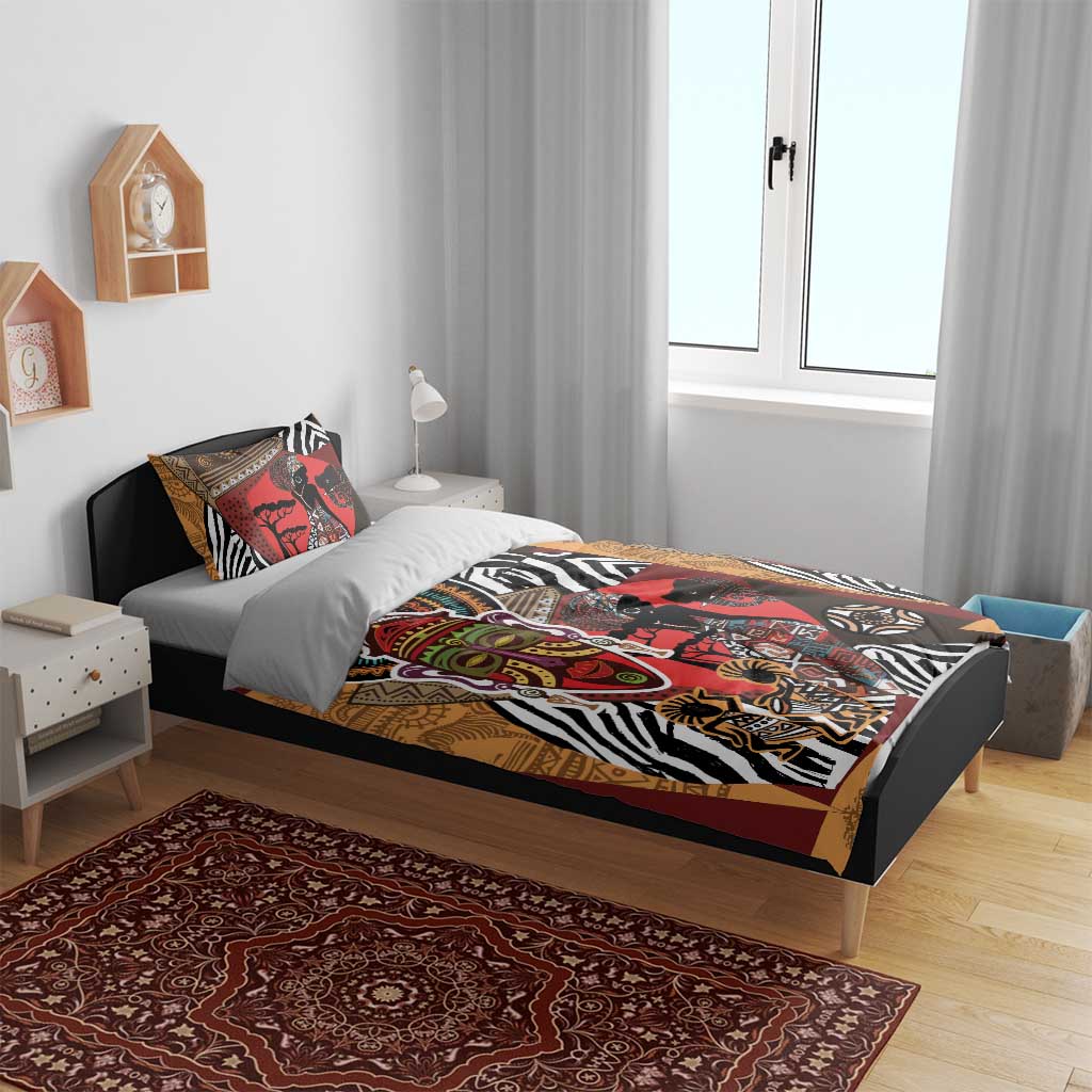 Bedding set with red, tan and black African portrait artwork and zebra stripe detail on duvet