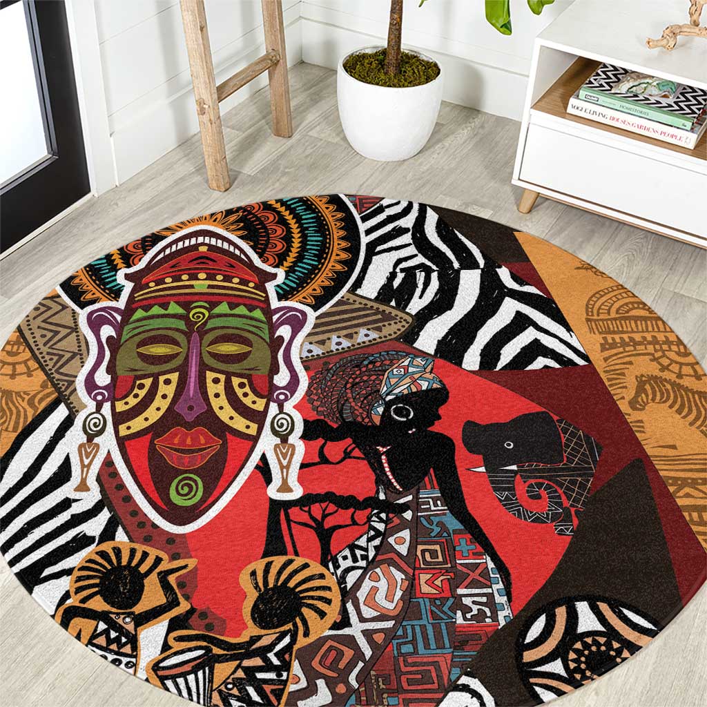 Round woven area rug with bold African face and zebra motifs in red, black, and tan.