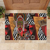 Rubber doormat with African ethnic motif art, central mask, zebras, and elephants