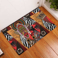 Rubber doormat rectangular with African mask artwork, zebra stripes, and red accents