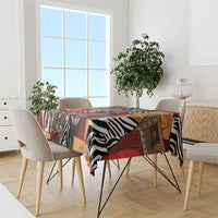 African-pattern tablecloth with zebra stripes and mask motifs in red, black, tan