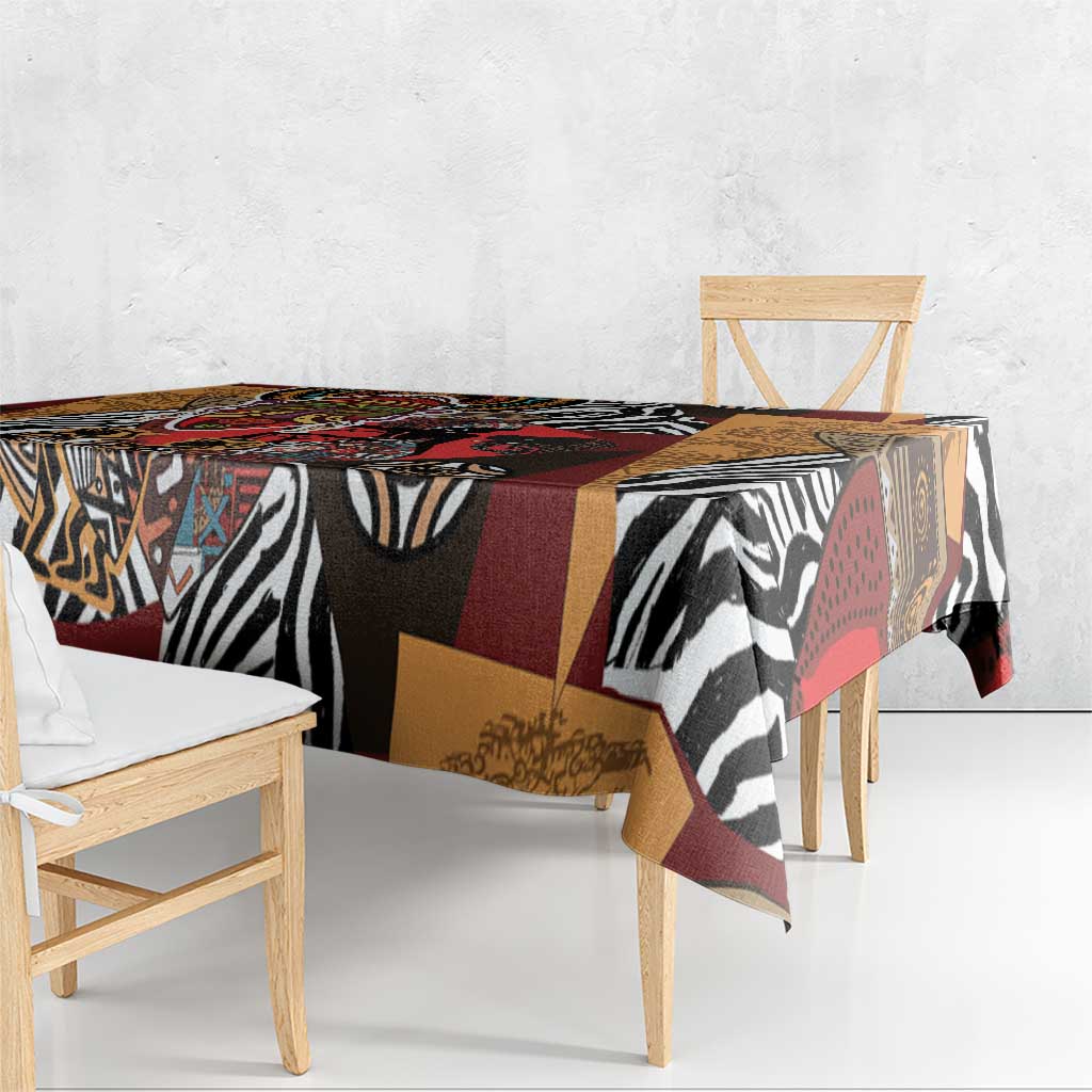 African-pattern tablecloth draped over table edge, zebra stripes and geometric blocks
