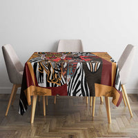 African-pattern tablecloth on dining table, multicolor zebra, mask, and geometric designs