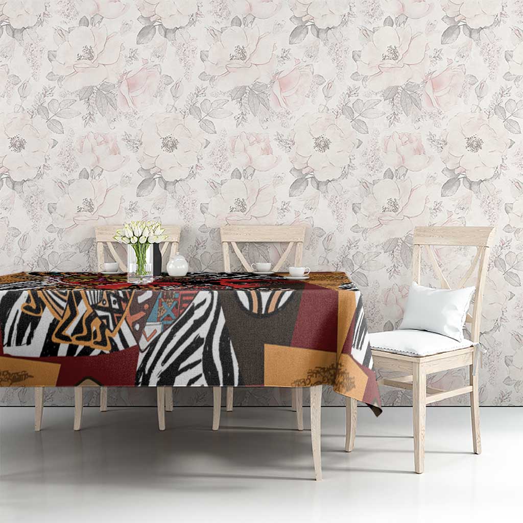 African-pattern tablecloth on table with red, black, tan panels and zebra stripe motif