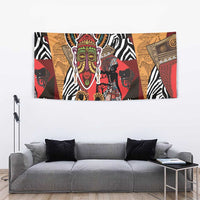 Red, tan, black, and white African tapestry with zebra stripes and a colorful mask face