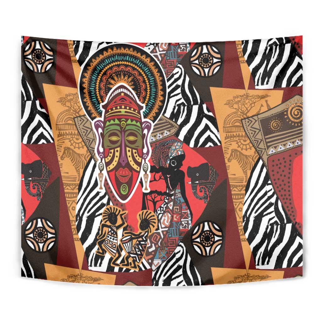 Close-up African tapestry with central ornate mask face and surrounding animal patterns