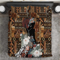 Bedding set with brown and black tribal pattern, portrait woman artwork, and floral accents
