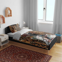 Bedding set on bed with brown tribal pattern, black woman portrait, and white floral details
