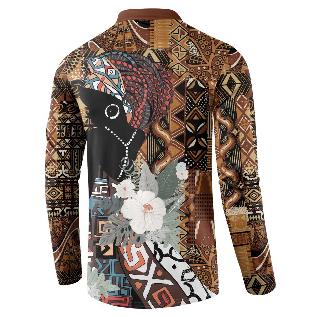 Brown long-sleeve sweatshirt with tribal pattern and portrait graphic with flowers, back view