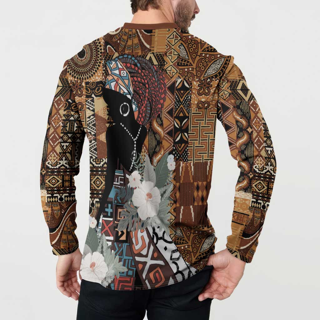Brown long-sleeve sweatshirt with tribal pattern and portrait graphic with flowers, back view