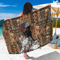 Black and brown African patterned sarong wrap with animal and floral graphics
