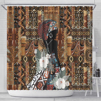 Shower curtain with brown tribal pattern and dark portrait, framed by curtain rod