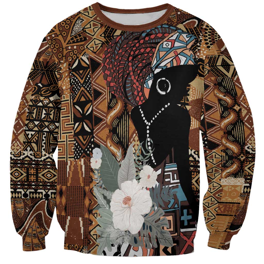 Unisex brown graphic sweatshirt with African tribal pattern and black woman silhouette