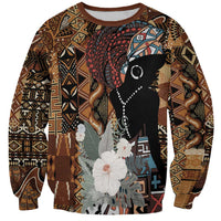 Unisex brown graphic sweatshirt with African tribal pattern and black woman silhouette