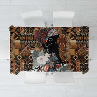 Rectangular tablecloth with black and brown tribal geometric pattern and floral details