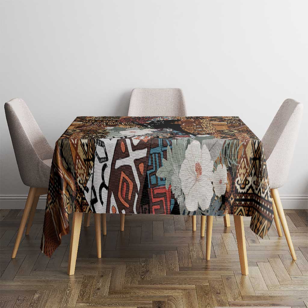 Rectangular tablecloth for dining table with black, brown, and blue tribal geometric design