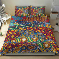 Red duvet set with two pillowcases and detailed animal-skin style pattern in blue and green