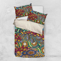 Flat-lay red duvet and two pillowcases with multicolor animal-skin style print